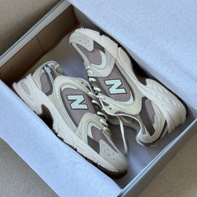 NB 530 Off White/Rose Feminino