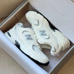 NB 530 Off White Feminino
