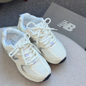 NB 530 Off White Feminino