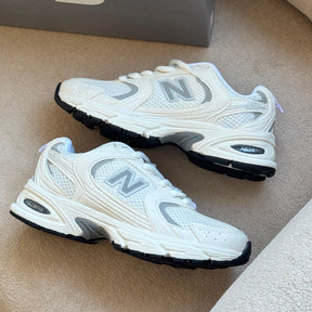 NB 530 Off White Feminino